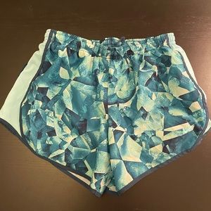 Blue Nike athletic shorts